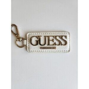 GUESS silver tone & off white color faux leather bag charm B13